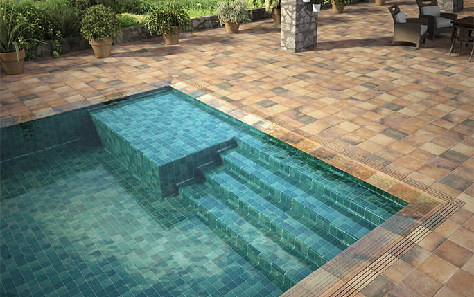 Tech Land, piscina con sistema desbordante Azulejos Pena